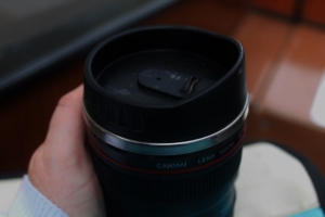 Drinking out of a camera-objective-styled thermo Cup caused a certain bewilderment, especially with the guy next to me who introduced himself (or rather his character) by asking me if I am at all able to handle such a camera :)